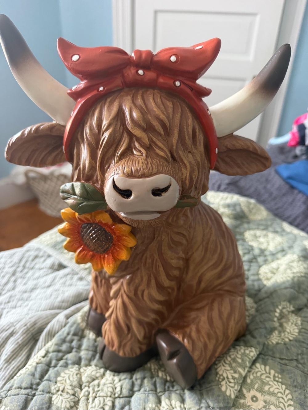 Whimsical Brown Highland Cow Figurine with Red Bow and Sunflower